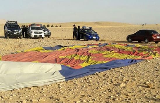 The remains of a hot air balloon is seen on the ground near the ancient city of Luxor after a fatal crash.