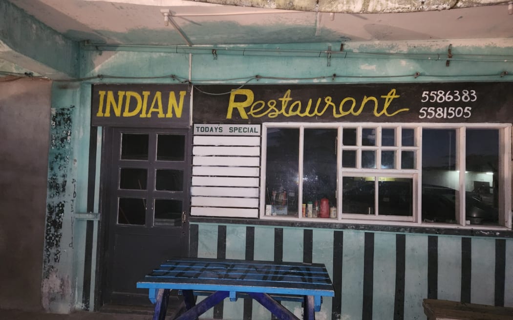 A now closed Indian restaurant opened by an asylum seeker from Pakistan.