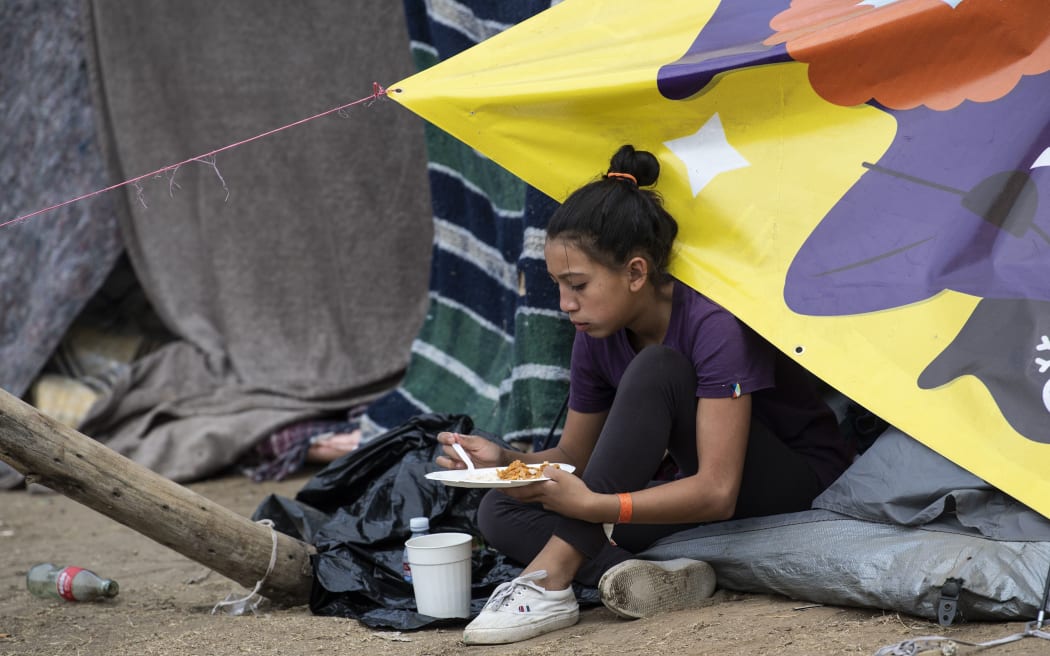 A Central American migrant at a temporary shelter in Tijuana, Mexico.