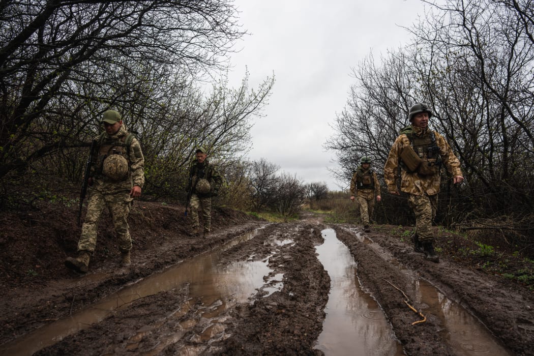 Ukrainian servicemen are seen along the frontline in Donbas, Ukraine on April 14, 2022.