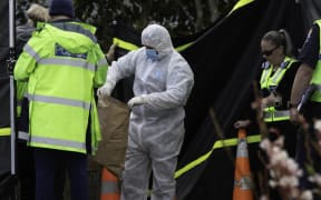 Police set up a tent a the scene of the crash on Naenae Road, Lower Hutt.