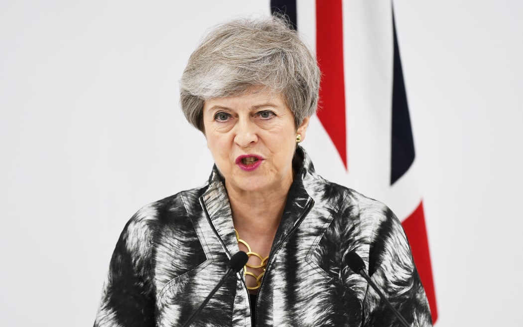 Britain's Prime Minister Theresa May speaks at a press conference following the G20 Osaka Summit in Osaka/