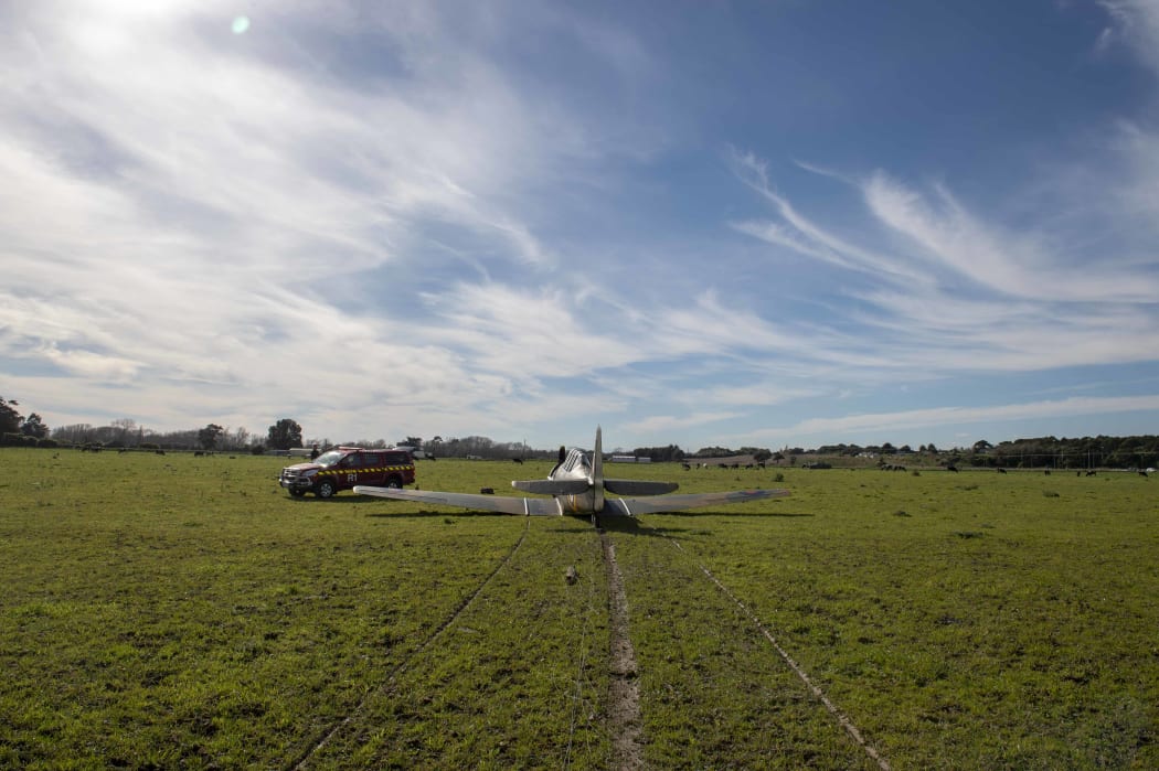North American Harvard NZ1015 in an emergency landing adjacent to RNZAF Ohakea Base.