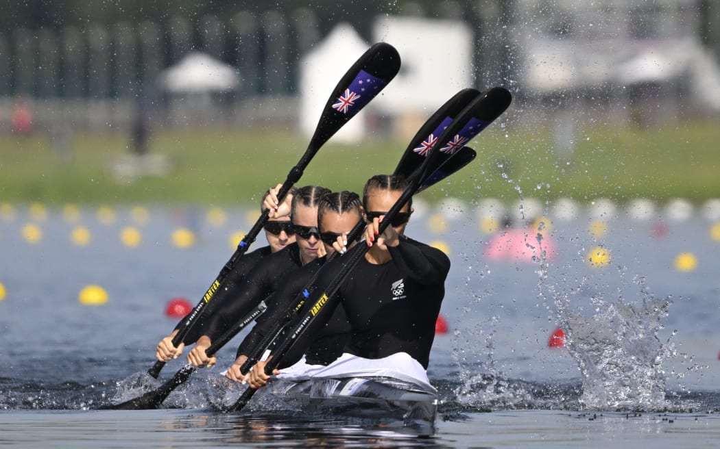 (FRONT-BACK) New Zealand's Lisa Carrington, New Zealand's Alicia Hoskin, New Zealand's Olivia Brett and New Zealand's Tara Vaughan compete in the women's kayak four 500m heats of the canoe sprint competition at Vaires-sur-Marne Nautical Stadium in Vaires-sur-Marne during the Paris 2024 Olympic Games on August 6, 2024. (Photo by Olivier MORIN / AFP)