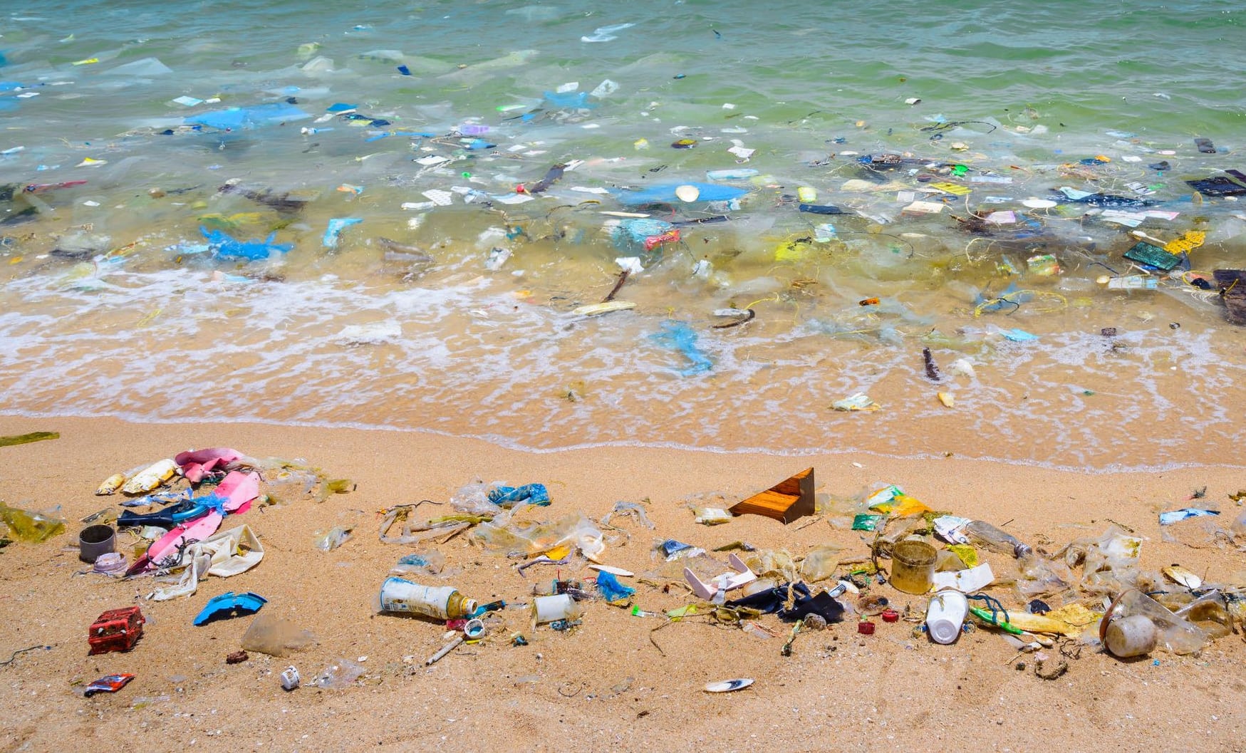 Plastics wash ashore on the tide.