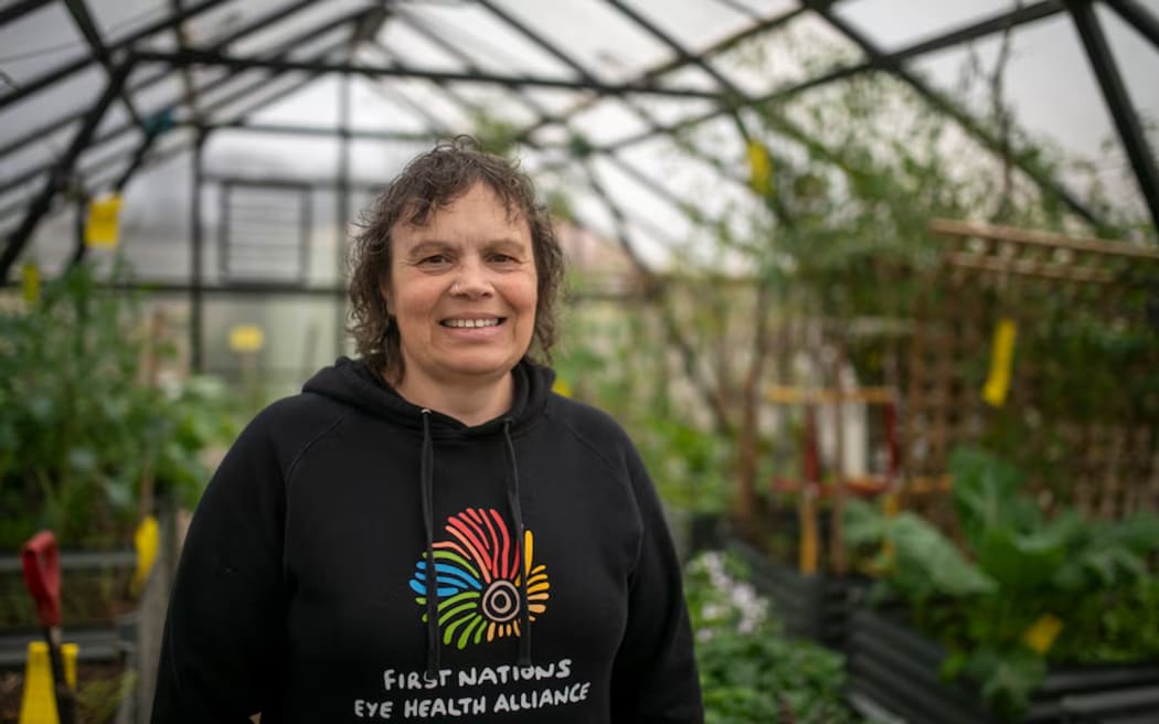 Tessa Atto spends time in the greenhouse as part of her role as the island's health and programs coordinator.