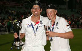 England captain Alistair Cook and Joe Root celebrate reclaiming Ashes during 2015 series.