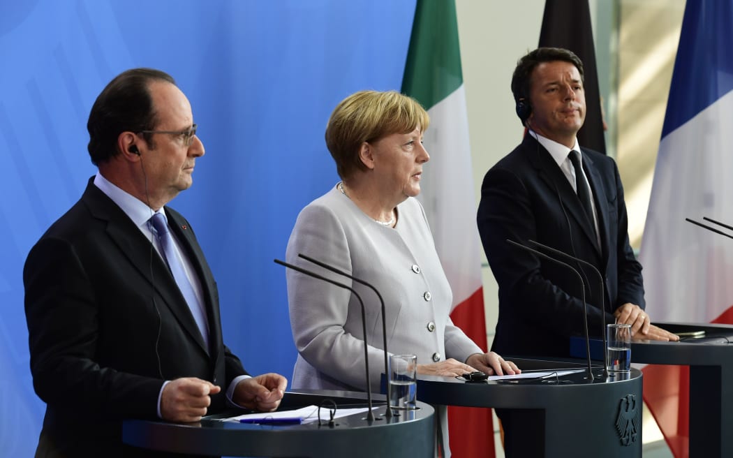 (from left) French President Francois Hollande, German Chancellor Angela Merkel and Italy's Prime Minister Matteo Renzi