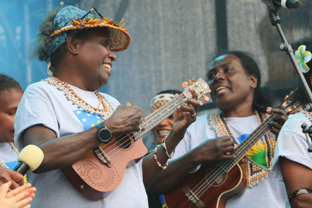 Glorious Oxenham, left, performing with the Solomon Islands community at the Wellington Pasifika Festival in January 2021. Oxenham has been honoured for her services to the Melanesian community in Aotearoa.
