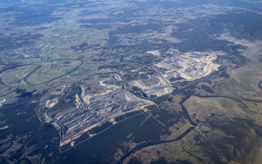 A photo taken on June 16, 2024 shows an aerial view of Glencore’s Bulga open-cut coal mine located near Mount Thorley, in the Hunter Valley region, north of Sydney. (Photo by DAVID GRAY / AFP)