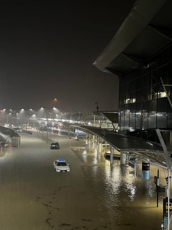 Flooding outside of the airport. (Supplied) Single use