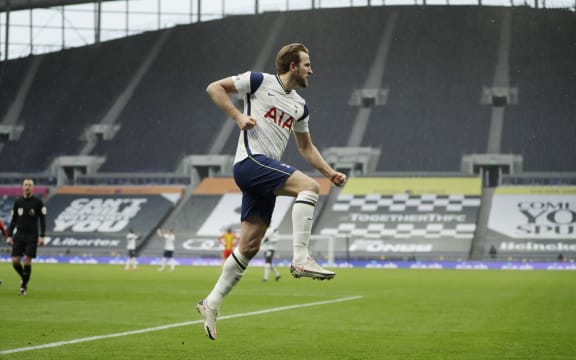 Tottenham Hotspur's English striker Harry Kane celebrates after scoring the opening goal of the English Premier League football match against West Bromwich Albion at Tottenham Hotspur Stadium in London, on February 7, 2021.