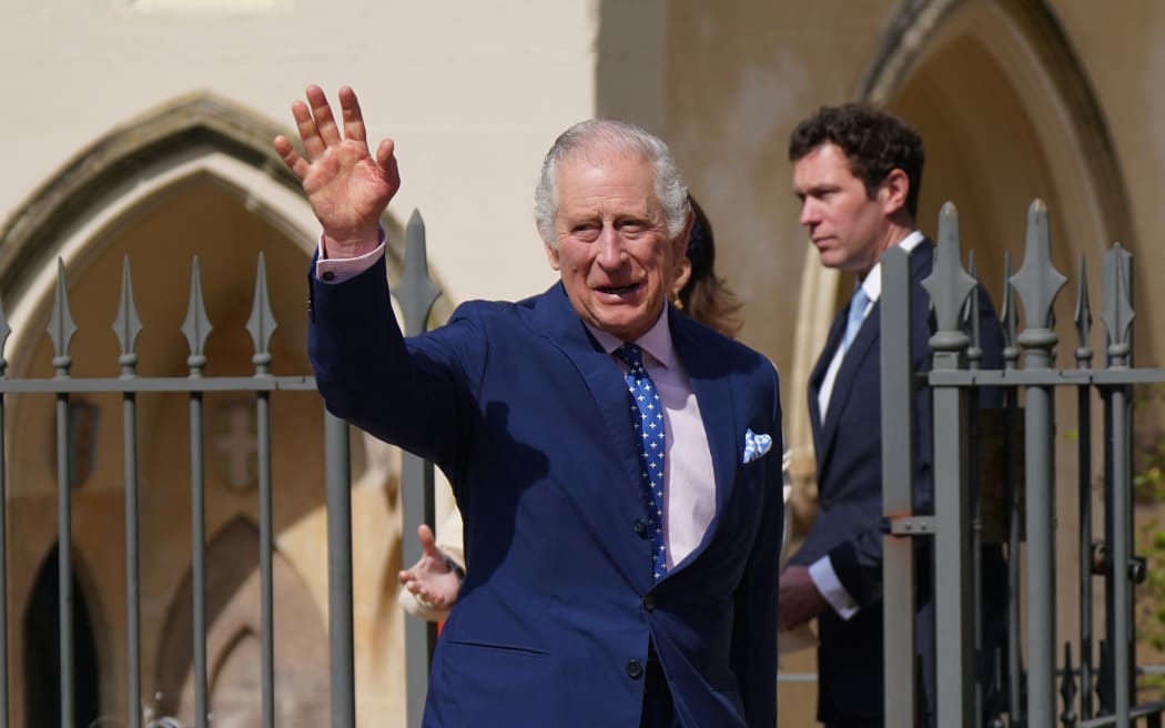 Britain's King Charles III smiles as he leaves after attending the Easter Mattins Service at St. George's Chapel, Windsor Castle on April 9, 2023. (Photo by Yui Mok / POOL / AFP)