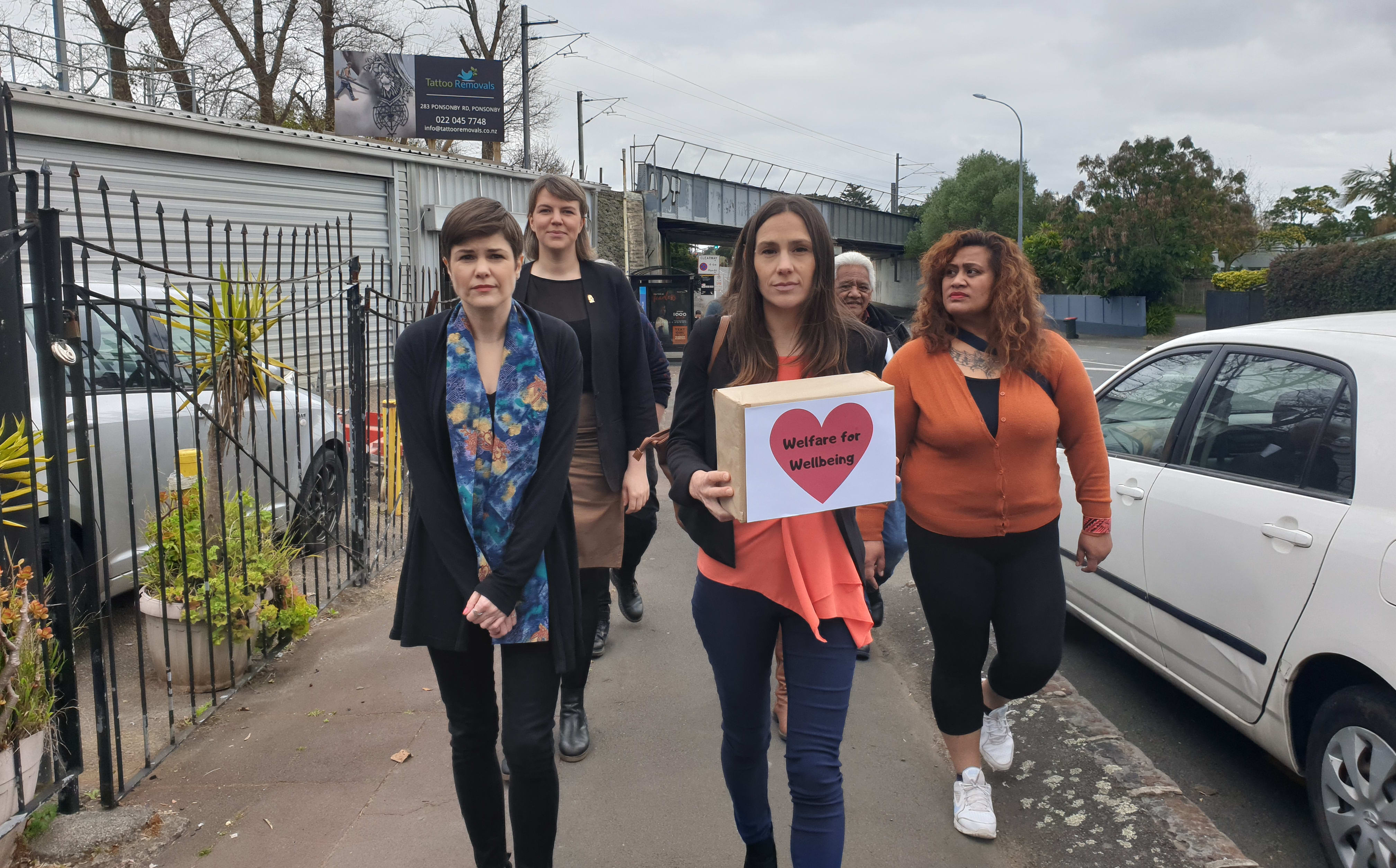 A petition calls for urgent changes to welfare system is delivered to Prime Minister Jacinda Ardern's electorate office in Auckland.