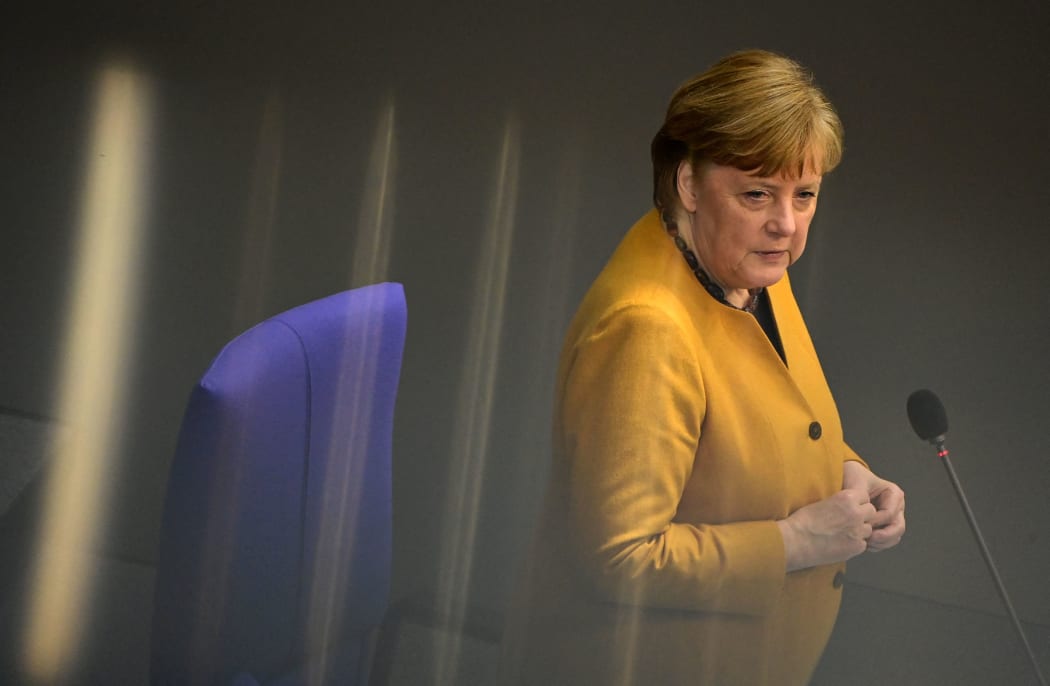 German Chancellor Angela Merkel speaks during question time at the Bundestag (lower house of parliament) in Berlin on 24 March 2021.