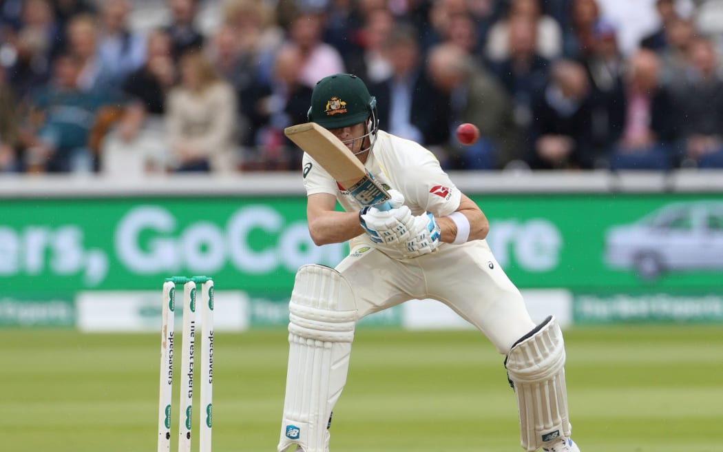Steve Smith avoids a bouncer.