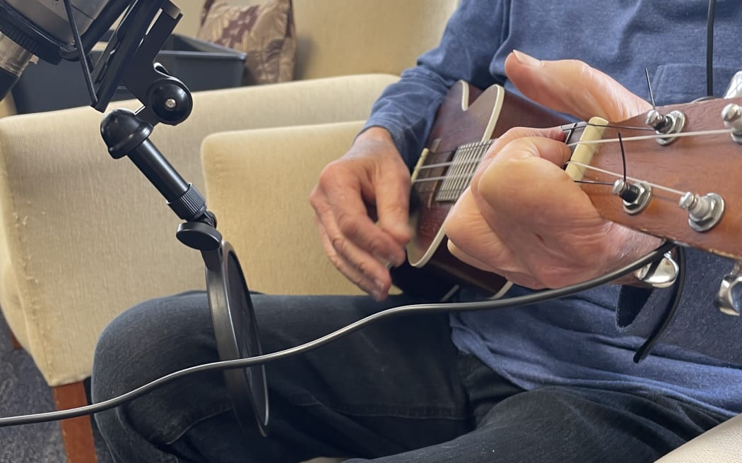 The guitarist who plays on The Selwyn Foundation Christmas Album corrected the chords he was given by music therapist Sam Scott.