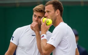 Michael Venus (right) and Ryan Harrison discuss tactics.