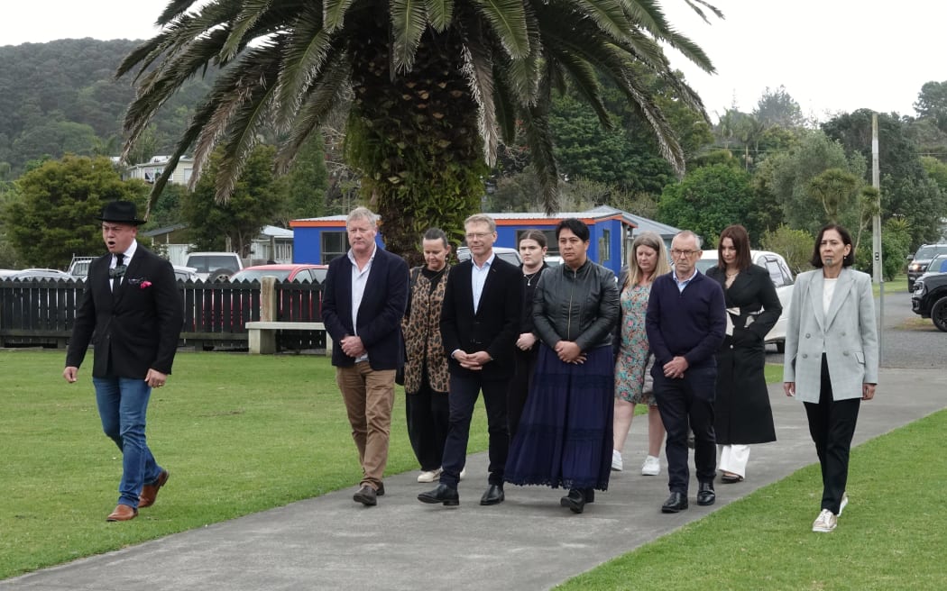 Isaiah Apiata (left) leads Treaty Negotiations Minister Paul Goldsmith and his delegation onto Whitiora Marae.