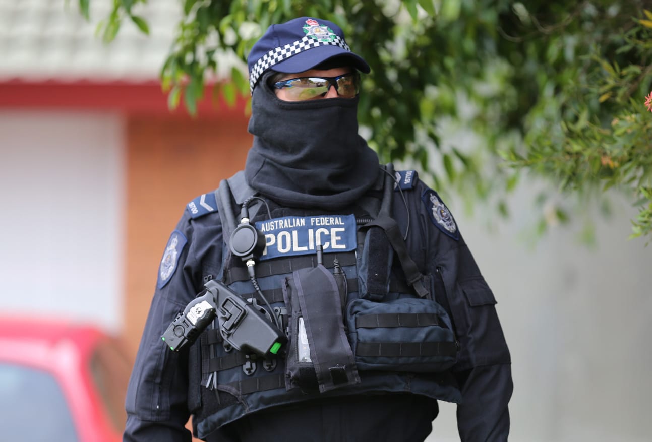 Australian federal police officers during a counter-terror operation at Raby in south-west Sydney on 10 December 2015.
