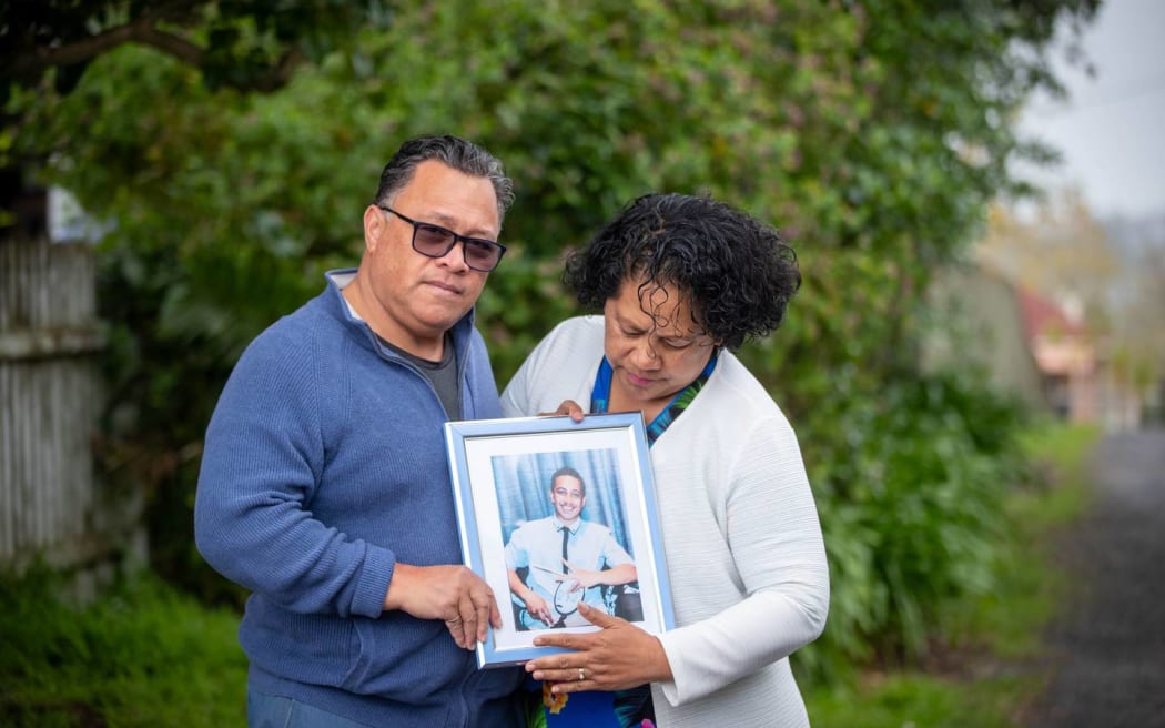 Rev Dr Matagi Vilitama and wife Joanna Matagi with a photo of their son Tofi Matagi, who died after being assaulted on 31 August.