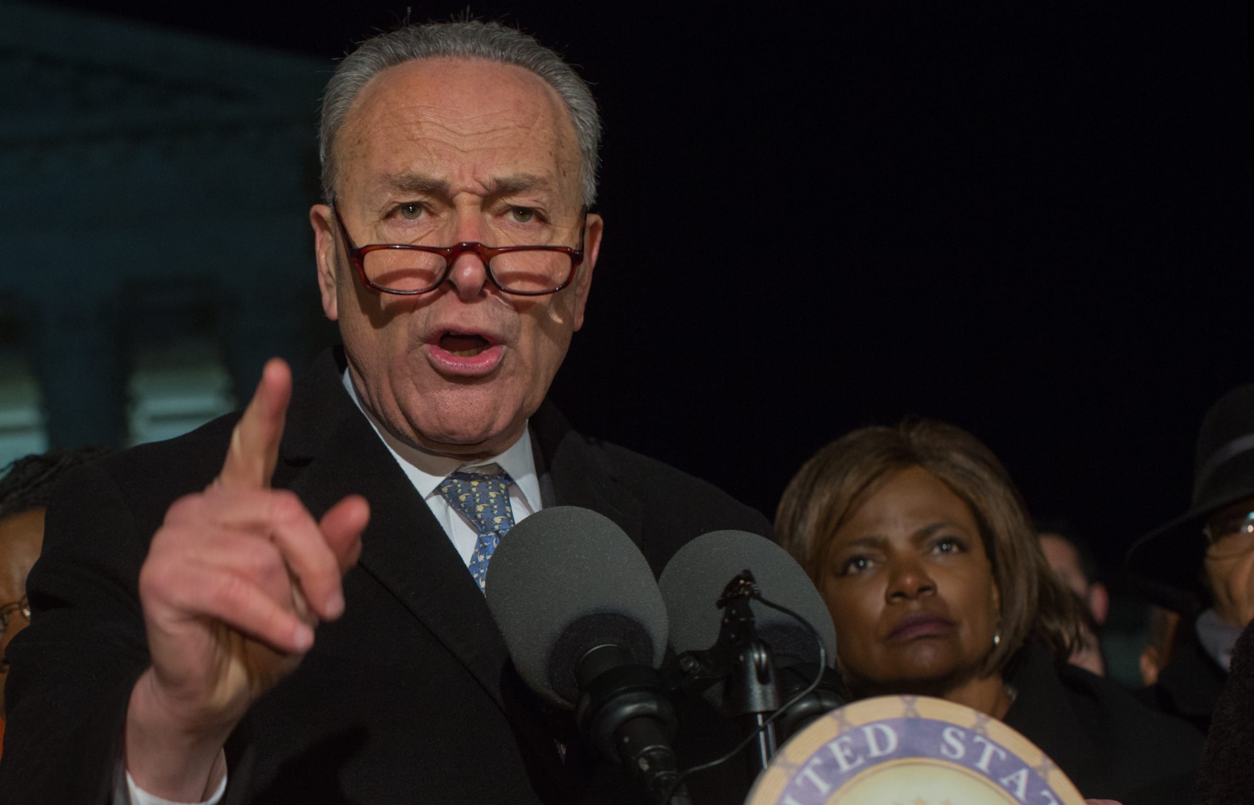 Charles Ellis "Chuck" Schumer, the senior United States Senator from New York and a member of the Democratic Party, speaks at a rally against Donald Trump.