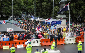 Music is pumping everywhere with protesters responding to Barry Manilow and Covid ads broadcast from Parliament with Twisted Sister.