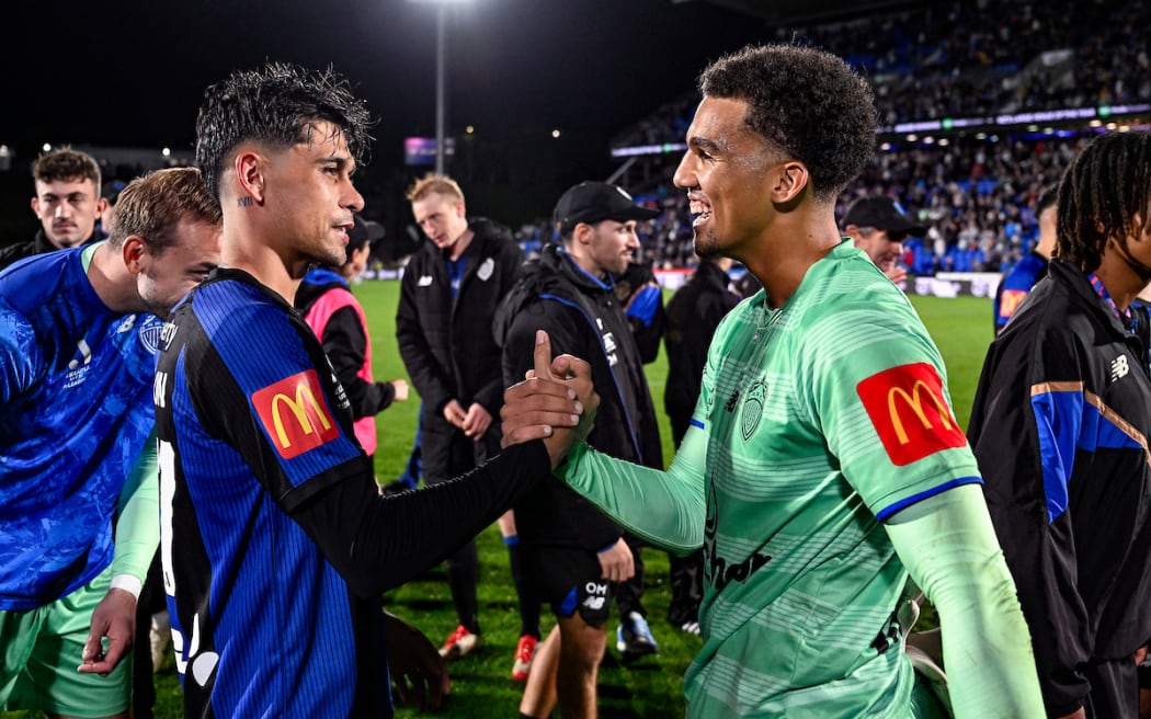 Logan Rogerson and Alex Paulsen of Auckland FC celebrate.