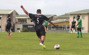 The inmates played a friendly match against prison staff to celebrate their graduation.
