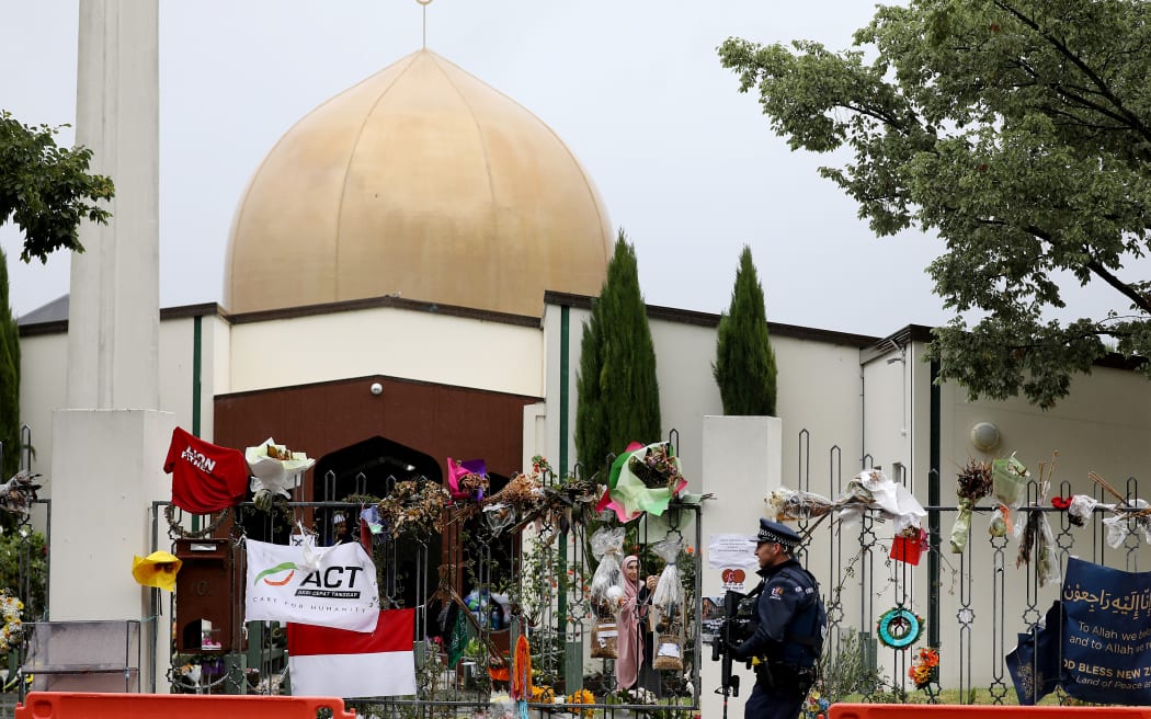 An armed police officer outside Al Noor Mosque in Christchurch, April 2019.