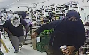 Robbers who attacked a worker at the Kingsford Supermarket in Mangere.