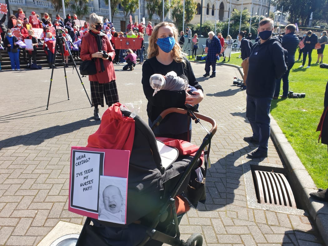 Georgia Choveaux and her son, Josef, who is nearly six weeks old, joined the rally to show her support for nurses in primary care.