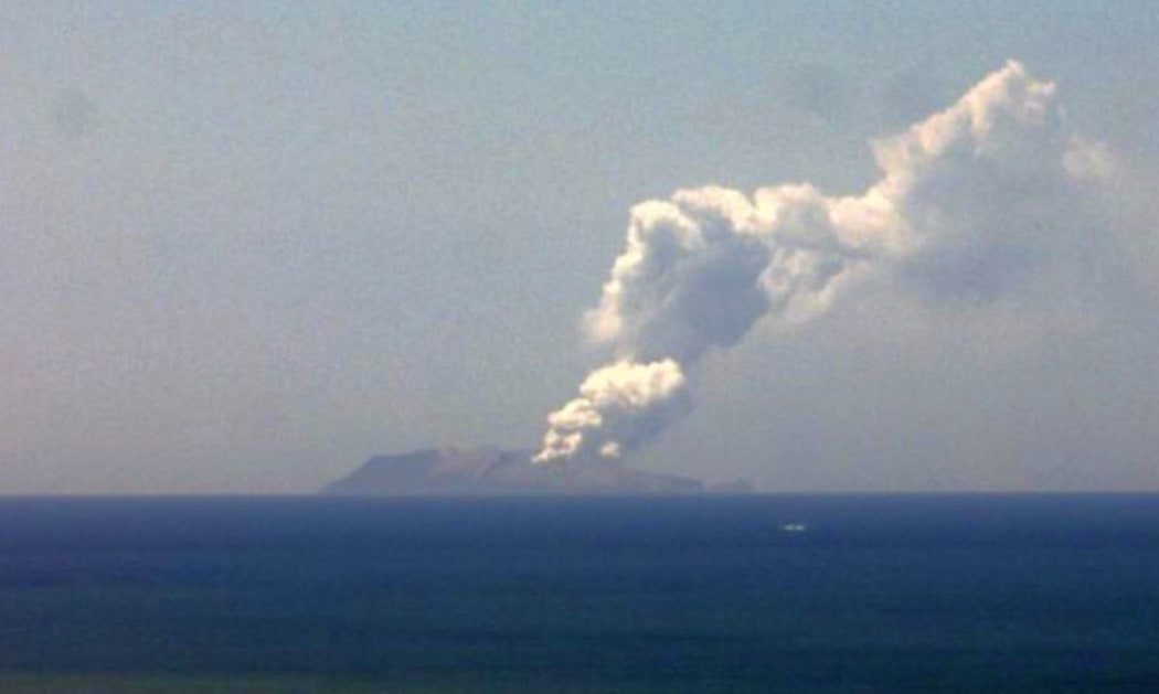 The ash cloud rising from White Island today.