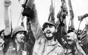 Cuba: Fidel Castro celebrating with revolutionary comrades.