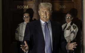 Former US president Donald Trump addresses the media before leaving the courthouse for the day at the New York State Supreme Court in New York on October 18, 2023. Former president Donald Trump returned to his New York civil fraud trial on October 17, 2023 and complained about a partial gag order imposed on him by a judge in a separate case. (Photo by Alex Kent / AFP)