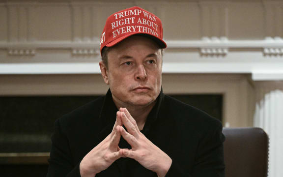 Elon Musk looks on during a cabinet meeting hosted by US President Donald Trump in the Cabinet Room of the White House on 24 March 2025, in Washington, DC.