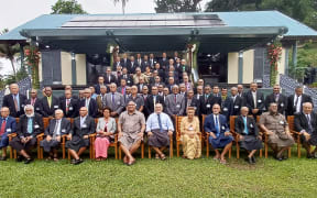 The interim membership of Fiji's Great Council of Chiefs pose for a photo after the reinstatement of the premier indigenous institution on Bau Island. 24 May 2023