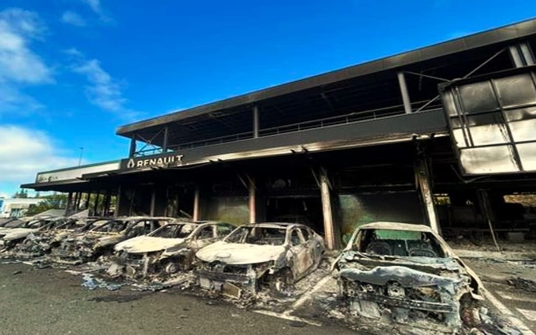 Burnt vehicles at the Renault dealership in Magenta district, Nouméa