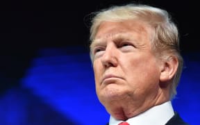 US President Donald Trump looks on before delivering a speech during the World Economic Forum (WEF) annual meeting on January 26, 2018 in Davos, eastern Switzerland.