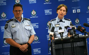New South Wales Police Commissioner Catherine Burn (R) and Australian Federal Police Deputy Commissioner Michael Phelan address the media after two 16-year-old boys were charged with terror-related offences in Sydney.