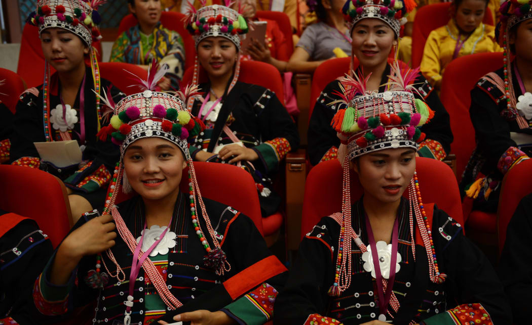 Myanmar Akha ethnic delegates wearing their traditional dress attend the opening of a peace conference in Naypyidaw on August 31, 2016.