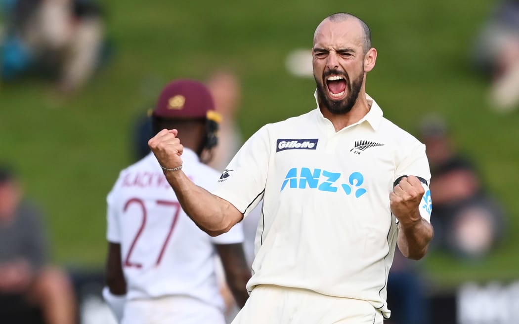 Daryl Mitchell celebrates the wicket of Jason Holder, his first test match wicket, New Zealand Black Caps v West Indies, Day 3 of the 1st international cricket test at Seddon Park, Hamilton on Saturday 5th December 2020. West Indies tour of New Zealand.