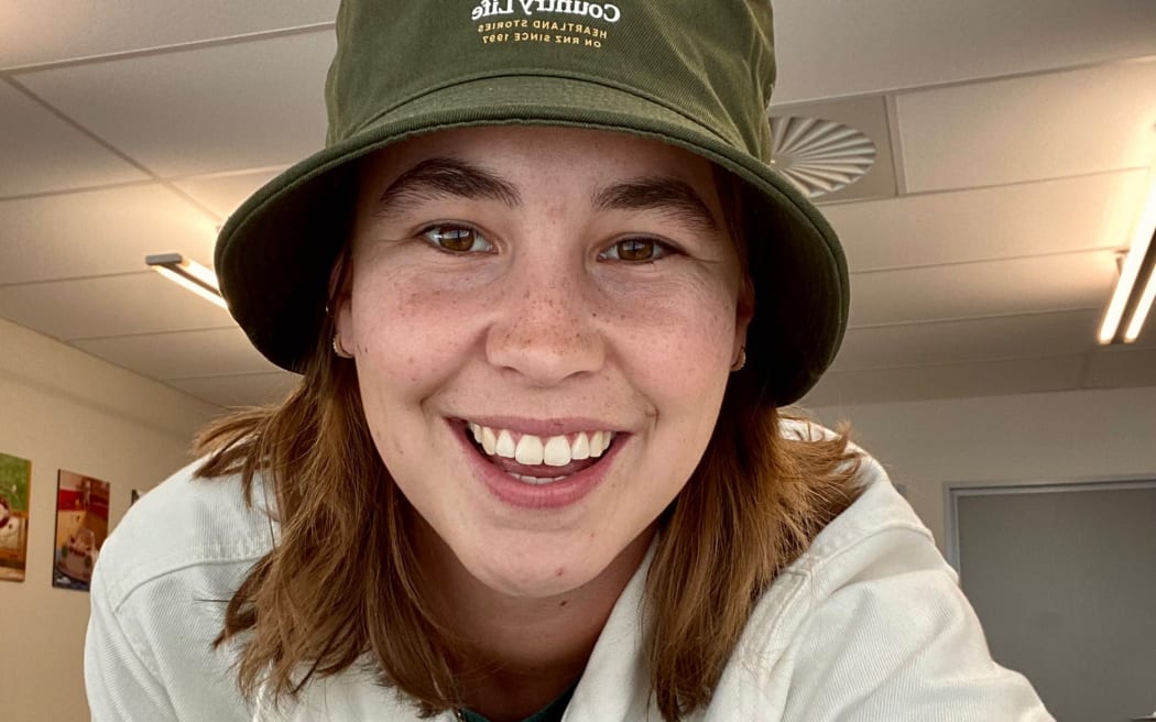 Country Life producer Leah Tebbutt wearing the 25th birthday celebratory bucket hat.