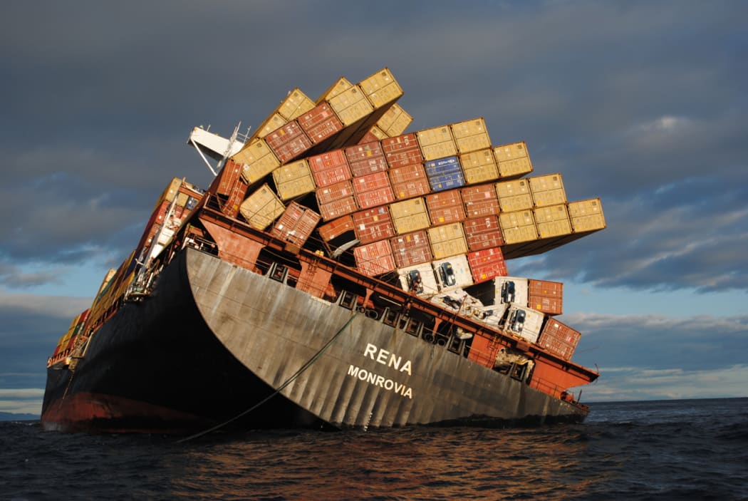 Containers and other cargo will not be taken off until all the oil is transferred.