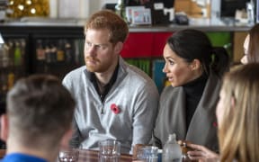 Prince Harry and his wife Meghan meet with representatives of mental health projects at Maranui cafe in Wellington.