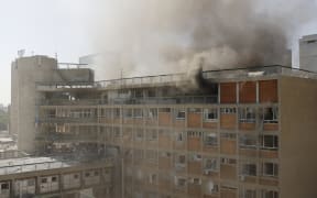 Smoke billows from Soroka Hospital in Beersheba in southern Israel following an Iranian missile attack.
