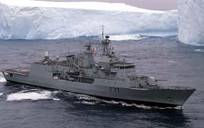 New Zealand's new frigate, Te Kaha, patrols past the Ross Ice Shelf in Antarctica on guard for pirate toothfishing boats.
