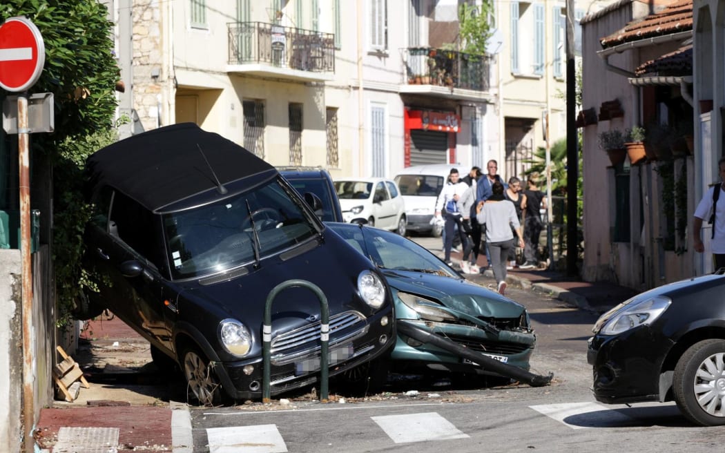 Damaged cars in Cannes after violent storms and floods struck the French Riviera.