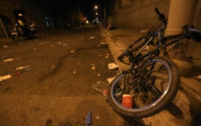 A bicycle lies deformed on the scene of a New Year's Eve stampede in Shanghai.