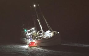 Fishing boat aground at Cobden Beach